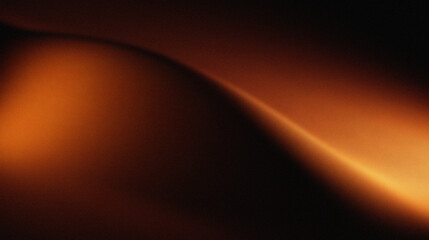 Orange, brown, and black colors that resemble folds of fabric or sand dunes in low light. The texture appears grainy, giving it a cinematic or artistic feel. © Mifta