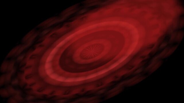 Red Circle Spinning in Dark Background