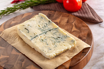 Tasty Italian gorgonzola cheese over board
