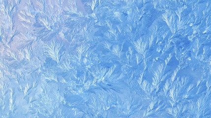 Obraz premium Close-up of a frosty ice surface. The intricate patterns and textures create an abstract and beautiful display.