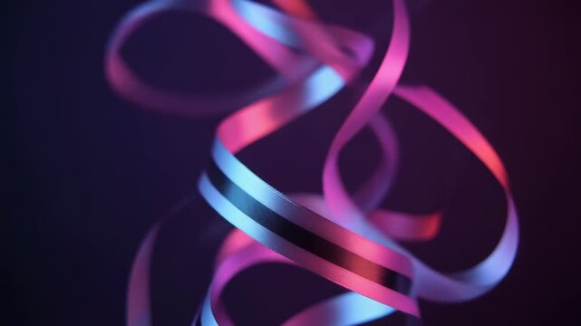 Vibrant abstract swirling ribbon shapes in pink and blue hues.