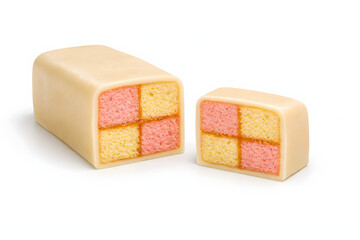 A perfectly sliced Battenberg cake reveals precise geometric sponge layers and glossy marzipan coating in elegant studio presentation