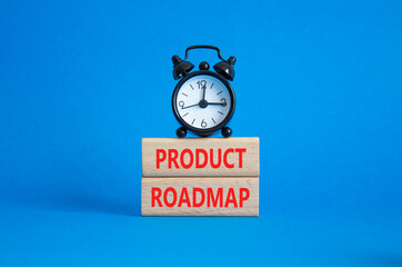 Product Roadmap symbol. Concept word Product Roadmap on wooden blocks. Beautiful blue background...