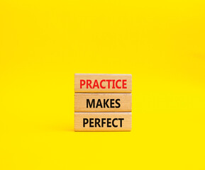 Naklejka premium Practice Makes Perfect symbol. Wooden blocks with words Practice Makes Perfect. Beautiful yellow background. Business and Practice Makes Perfect concept. Copy space.