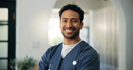 Fototapeta premium Man, doctor and happy in portrait at clinic with pride, confident or service for wellness in lobby. Person, medical professional and surgeon with smile, healthcare and career at hospital in Indonesia