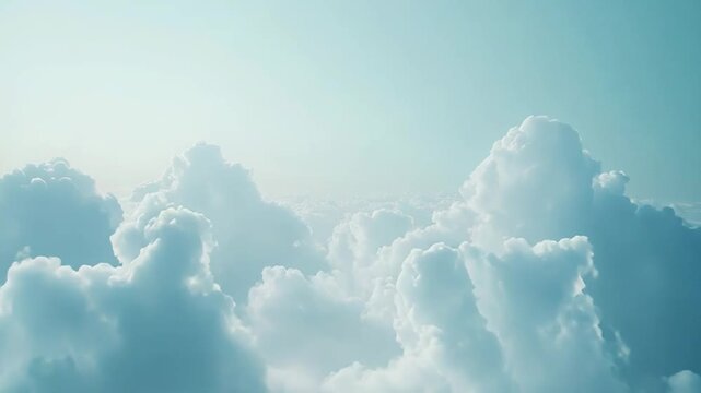 Fluffy white cumulus clouds form a dreamlike aerial vista over clear blue and turquoise sky, creating a tranquil, airy background perfect for travel, nature, and serenity themes