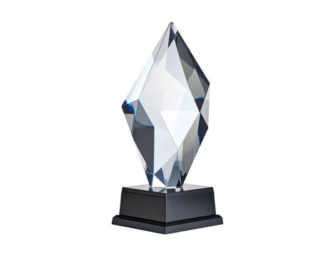Faceted crystal trophy with a sleek black base, isolated on black