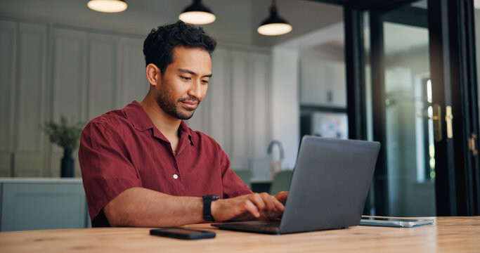 Laptop, typing and businessman in office with research for full stack development with project. Technology, professional and male web developer with computer for online coding report in workplace.