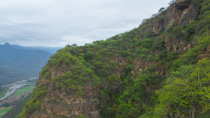 Aerial drone panoramic natural landscapes of Lambayeque, Peru, featuring forests, agricultural fields, and rural scenery near main cities and villages, ideal for tourism, marketing and graphic design