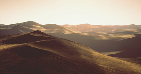 Naklejka premium Sunset over arid dunes with deep shadows and rippled sand, landscape explorer framing silhouette lines and vast sky, contemplative mood with amber hues