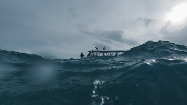 Boat with passengers in the rough seas