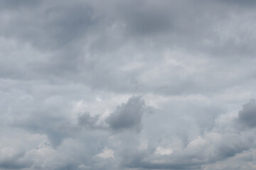 Obraz premium Overcast grey sky with heavy rain clouds background.