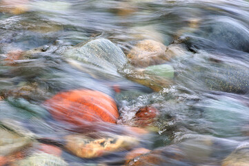 colorful rocks in a stream