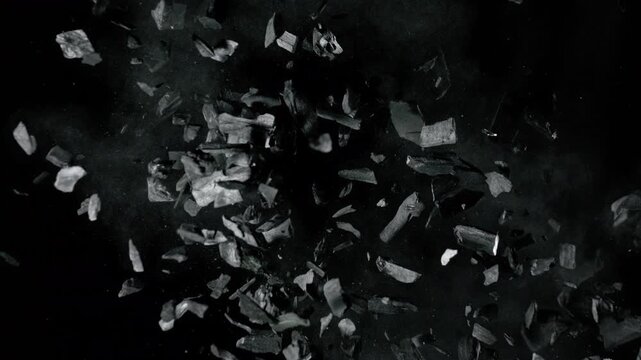 Super Slow Motion of Black Charcoal Colliding in Mid-Air at 1000 fps.