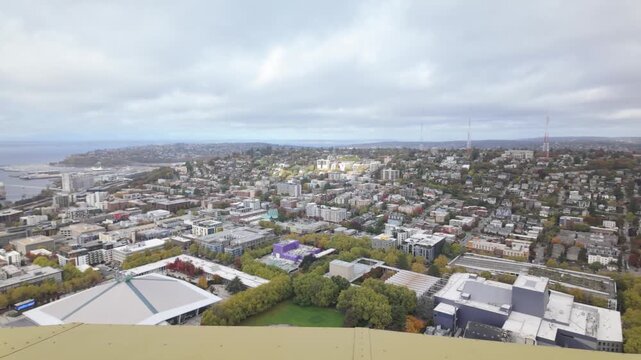 Gimbal wide panning shot of the Queen Anne neighborhood from the observation deck of the Space Needle in Seattle, Washington. 4K at 30 FPS
