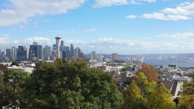 Gimbal panning shot of the downtown skyline from the Queen Anne Hill overlook during fall in Seattle, Washington. 4K at 30 FPS