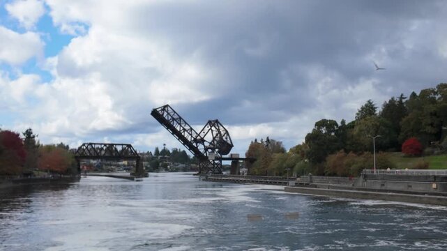 Gimbal wide panning shot of the Ballard Locks during autumn in Seattle, Washington. 4K at 30 FPS