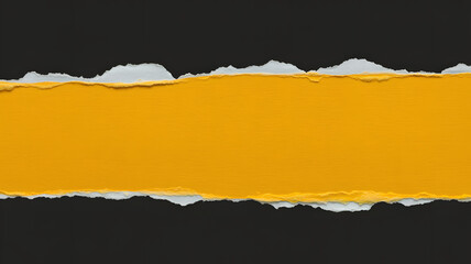 Torn yellow paper strip on black background with copy space
