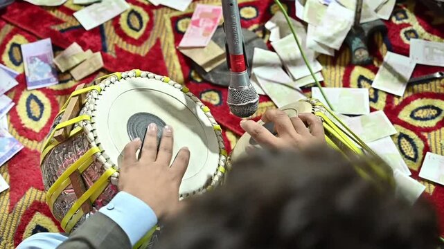 Close up of hands of amazing indian percussion musician performing with tabla in slow motion 4k video