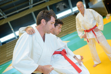 portrait of men in judo competition