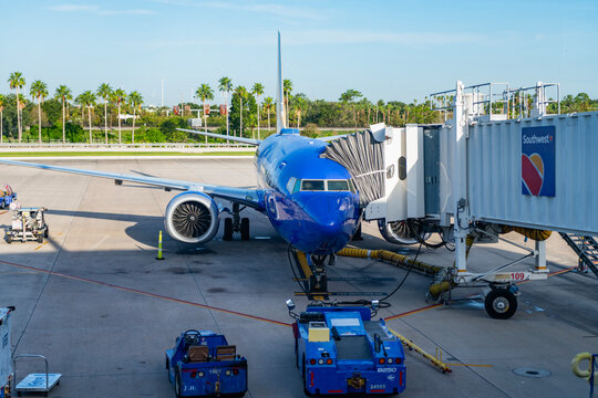 Miami, Florida, USA - August 06, 2025: Boeing 737 MAX. Airplane terminal for airline. Southwest airline plane departure airport. Airport terminal. Departure and arrival at airport. Southwest Airlines