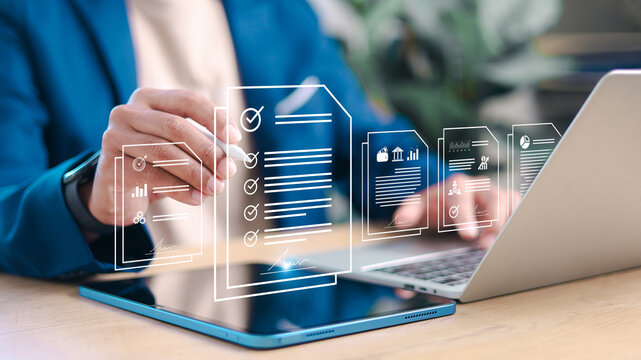 Business professional reviewing and approving digital documents on tablet and laptop with checklist interface. Concept of workflow approval, compliance, audit, e-signature, and business analytics.