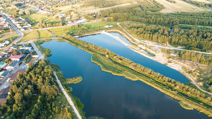 Fototapeta premium Drone shot of a winding lake shoreline