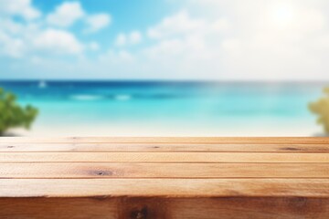 Fototapeta premium Empty wooden tabletop providing copy space with a bright tropical beach and blue ocean backdrop