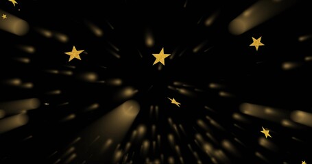 Obraz premium Glittering gold 5-pointed stars radiating long golden streaks on studio void, glinting