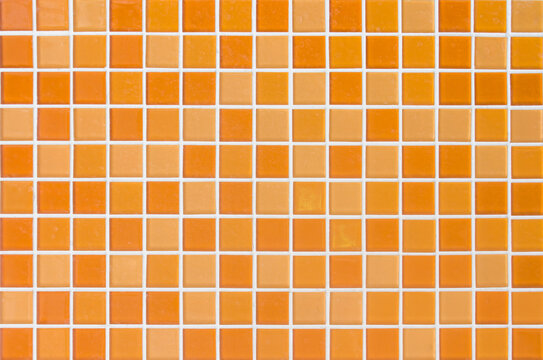 Orange light ceramic wall and floor tiles mosaic background in bathroom and kitchen. Design pattern geometric with grid wallpaper texture decoration pool. Simple seamless abstract surface clean.