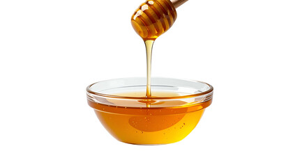 Golden honey flows from a dipper into a clear glass bowl, isolated on black
