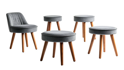 A gray upholstered chair and four matching stools with wooden legs, isolated on black