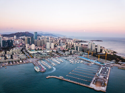 Qingdao Coastline Aerial View at Dusk with Marina and Skyline