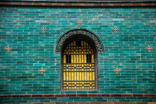 Xining Temple Turquoise Brick Wall with Yellow Window, China