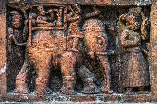 Closeup of terracotta carving scene of nobleman smoking hookah in howdah on elephant at ancient Kantaji hindu temple, Kantanagar, Dinajpur, Bangladesh