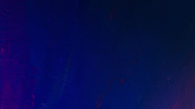 Abstract image featuring a dark blue and black gradient with faint textures and subtle red accents across a moody, atmospheric surface