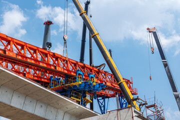 Bridge Construction with Heavy Crane Lifting Steel Structure
