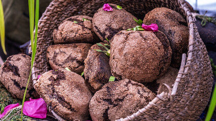 Traditional dark rye bread in wicker basket