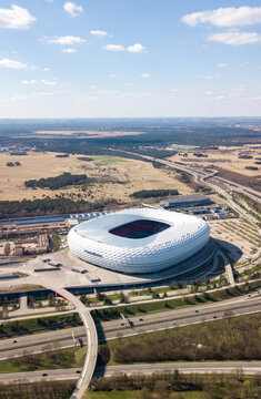 Munich, Germany - April 04, 2021: Drone flight over Football stadium Allianz Arena at sunny day