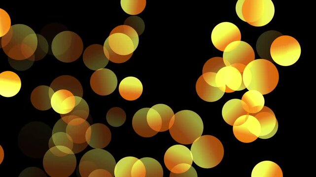 Golden bokeh lights on black background