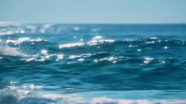 Ocean's Embrace: Witness the tranquil beauty of the ocean as sunlight dances upon the water's surface, creating a mesmerizing spectacle of shimmering light.
