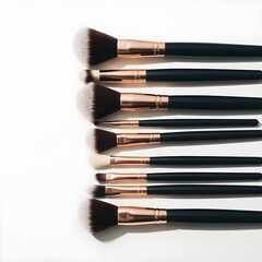 Set of 9 Professional Black and Rose Gold Makeup Brushes on White Background