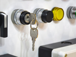 Key inserted into a lock showing a close-up view of a key and locking mechanism in a controlled setting