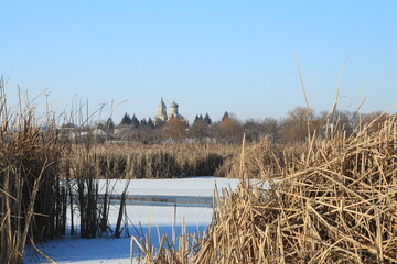 A river with a castle in the distance