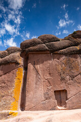 Reddish rock formations in Aramu Muru