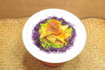 Top View of Crispy Seafood Omelet with Sweet and Sour Sauce