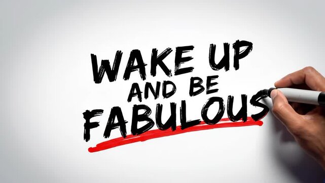 Hand writing motivational quote wake up and be fabulous on whiteboard