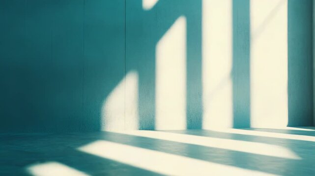 Abstract interior space featuring architectural elements and bright sun creating geometric patterns of light and shadow on the wall and concrete floor. Conveying concepts of modern design and serenity