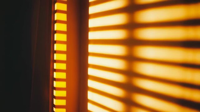 Warm sunlight diffusing through window blinds, creating a dynamic play of parallel shadows and bright stripes on an interior wall, evoking a feeling of tranquility and modern aesthetic