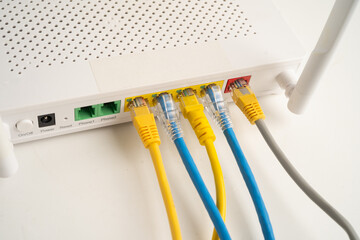 Ethernet cable with wireless router connect to internet service provider network.